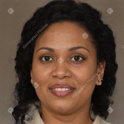 Joyful latino adult female with medium  brown hair and brown eyes