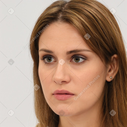 Neutral white young-adult female with long  brown hair and brown eyes