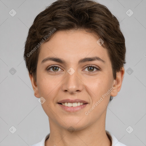 Joyful white young-adult female with short  brown hair and brown eyes