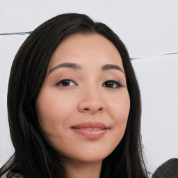 Joyful white young-adult female with long  black hair and brown eyes