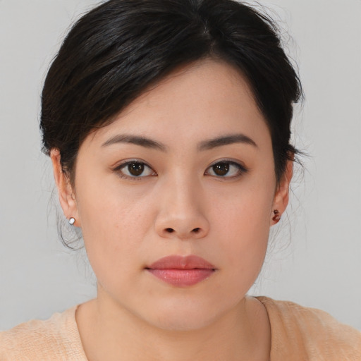 Neutral asian young-adult female with medium  brown hair and brown eyes