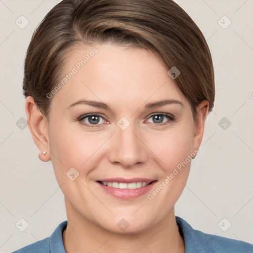 Joyful white young-adult female with short  brown hair and grey eyes