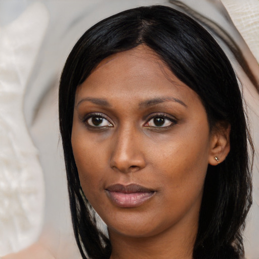 Neutral latino young-adult female with long  black hair and brown eyes