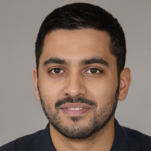 Neutral latino young-adult male with short  black hair and brown eyes