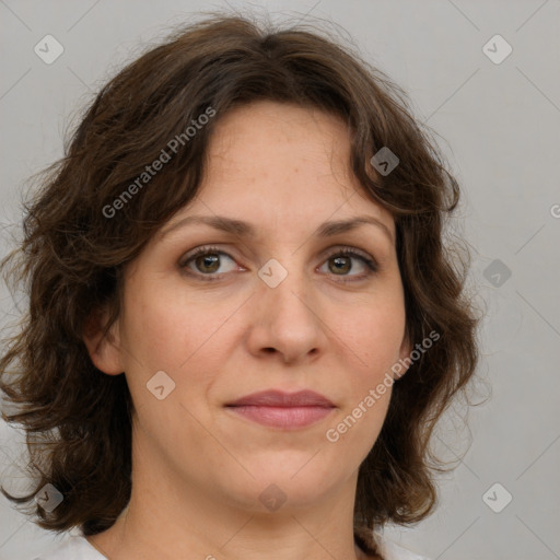 Joyful white young-adult female with medium  brown hair and green eyes