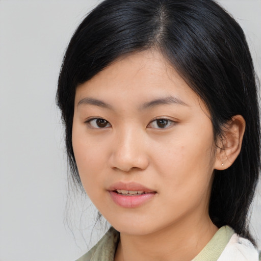 Neutral asian young-adult female with medium  black hair and brown eyes