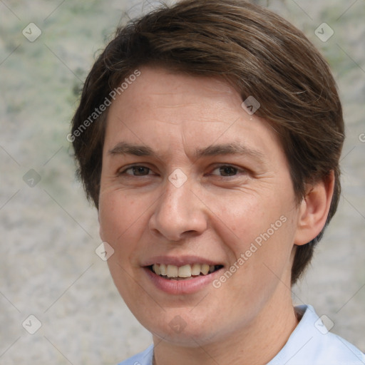 Joyful white adult female with short  brown hair and brown eyes