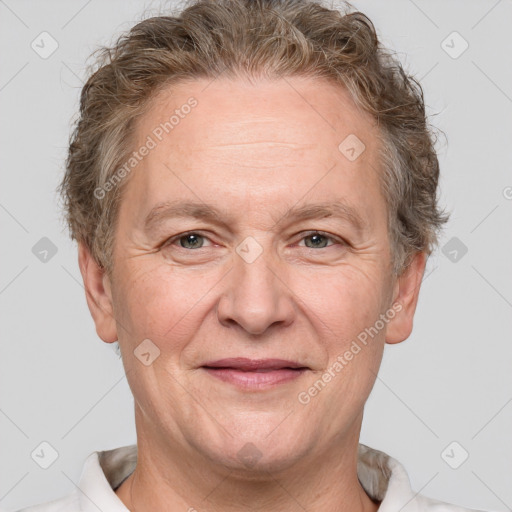 Joyful white middle-aged male with short  brown hair and brown eyes