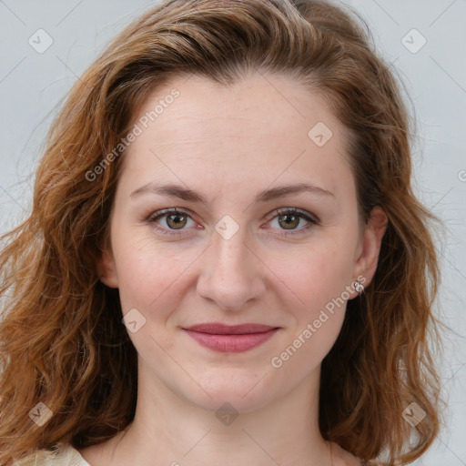 Joyful white young-adult female with medium  brown hair and blue eyes