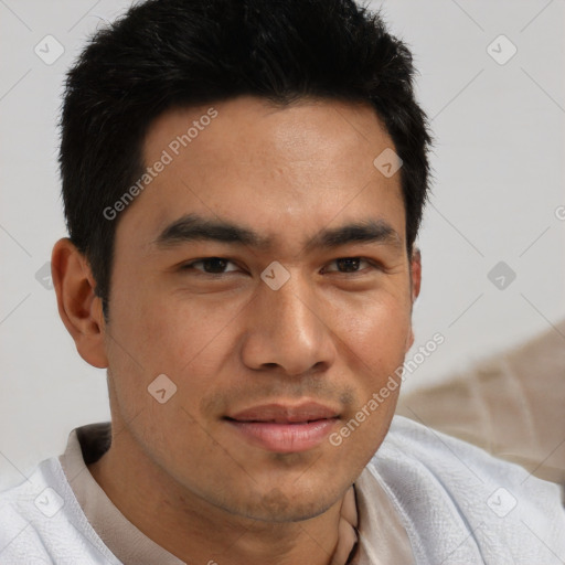 Joyful asian young-adult male with short  brown hair and brown eyes