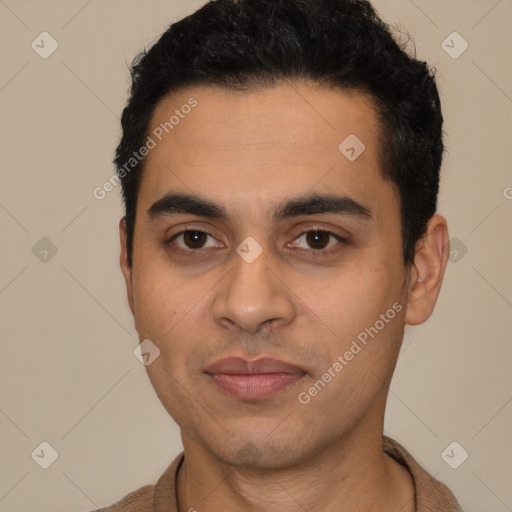 Joyful latino young-adult male with short  black hair and brown eyes