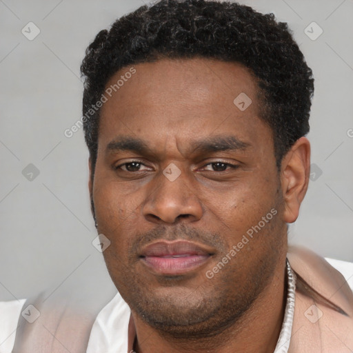 Neutral black young-adult male with short  brown hair and brown eyes