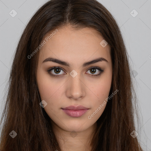 Neutral white young-adult female with long  brown hair and brown eyes