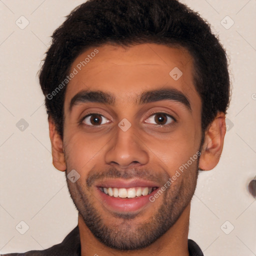 Joyful latino young-adult male with short  brown hair and brown eyes