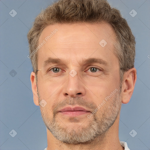 Neutral white adult male with short  brown hair and brown eyes