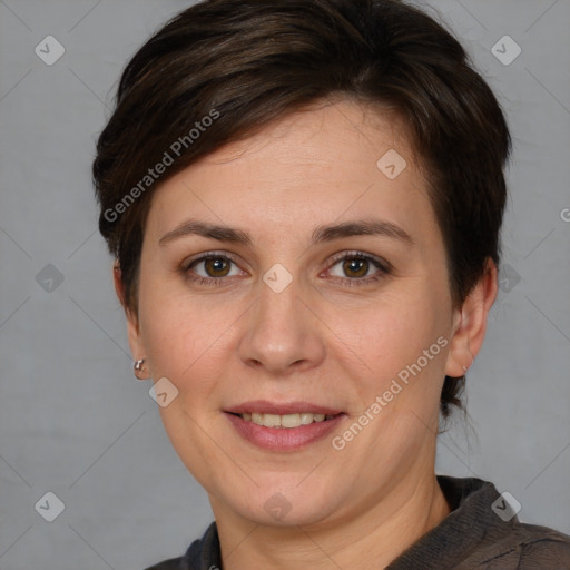 Joyful white adult female with medium  brown hair and brown eyes