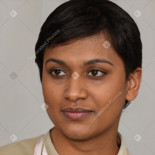 Joyful latino young-adult female with short  black hair and brown eyes