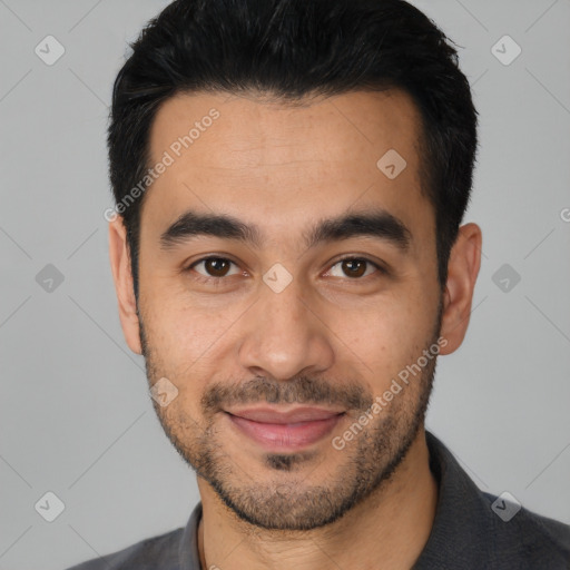 Joyful latino young-adult male with short  black hair and brown eyes