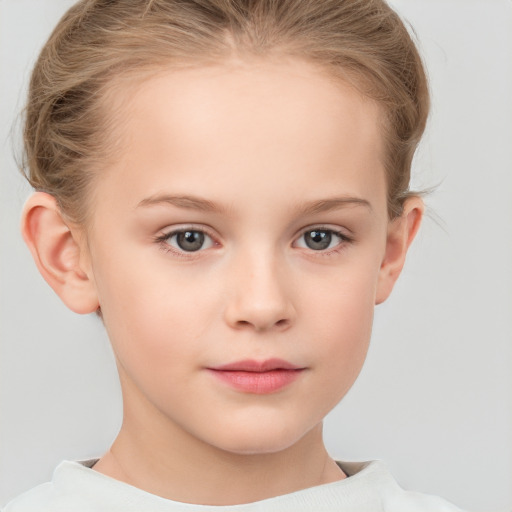 Neutral white child female with short  brown hair and grey eyes