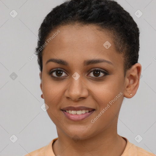 Joyful black young-adult female with short  brown hair and brown eyes