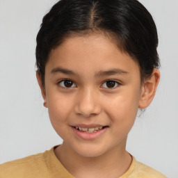 Joyful white child female with short  brown hair and brown eyes