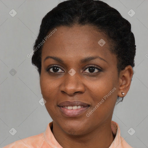 Joyful black young-adult female with short  brown hair and brown eyes