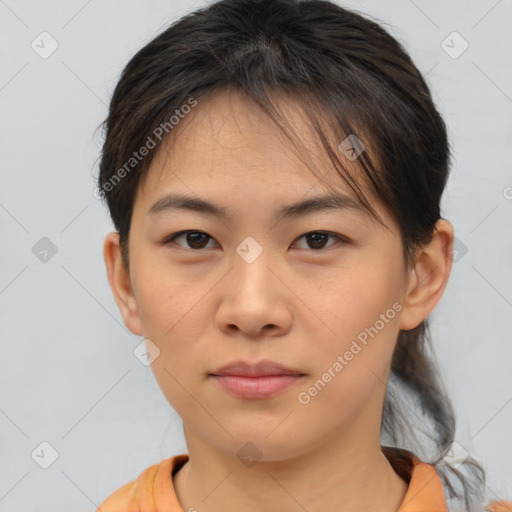 Neutral asian young-adult female with short  brown hair and brown eyes