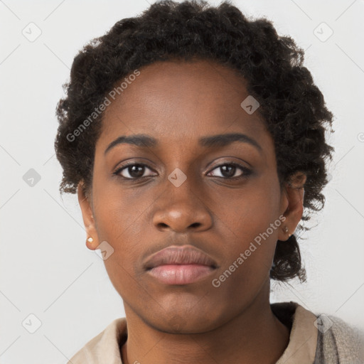 Neutral black young-adult female with short  brown hair and brown eyes