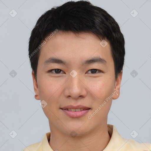 Joyful asian young-adult male with short  black hair and brown eyes