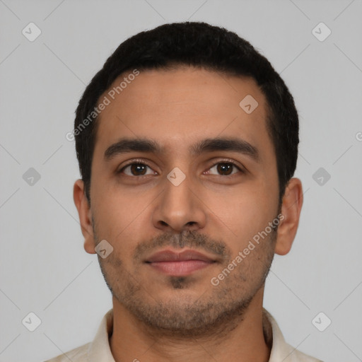 Neutral latino young-adult male with short  black hair and brown eyes