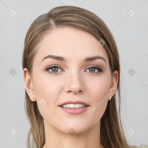 Joyful white young-adult female with long  brown hair and grey eyes