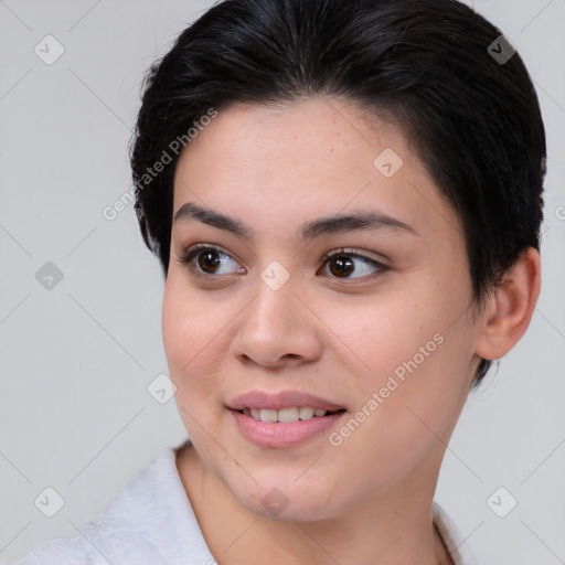 Joyful white young-adult female with short  brown hair and brown eyes