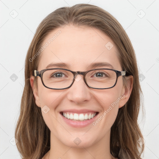 Joyful white young-adult female with long  brown hair and blue eyes