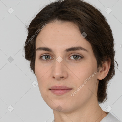 Neutral white young-adult female with medium  brown hair and brown eyes