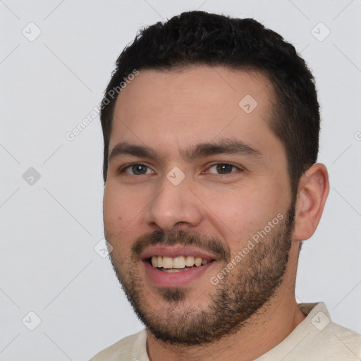 Joyful white young-adult male with short  black hair and brown eyes