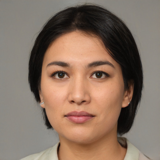 Neutral latino young-adult female with medium  black hair and brown eyes