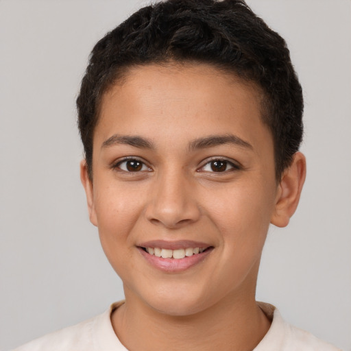 Joyful latino young-adult female with short  brown hair and brown eyes