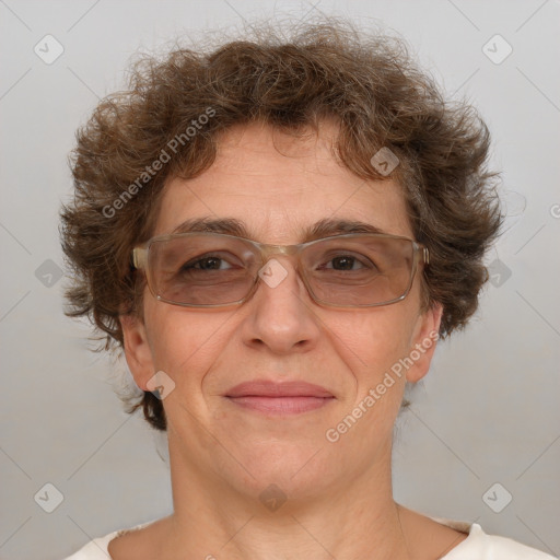 Joyful white adult female with short  brown hair and brown eyes