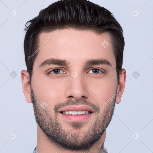 Joyful white young-adult male with short  brown hair and brown eyes