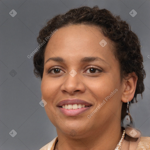 Joyful latino young-adult female with short  brown hair and brown eyes