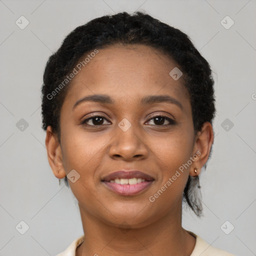 Joyful black young-adult female with short  brown hair and brown eyes