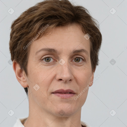 Joyful white adult female with short  brown hair and brown eyes