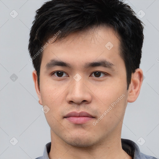 Neutral asian young-adult male with short  black hair and brown eyes