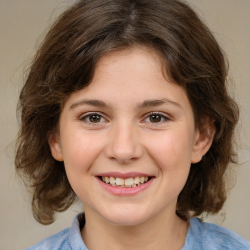 Joyful white child female with medium  brown hair and brown eyes