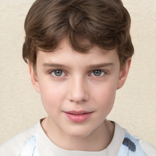 Joyful white child male with short  brown hair and grey eyes