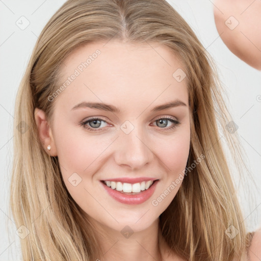 Joyful white young-adult female with long  brown hair and blue eyes