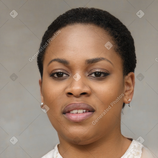 Joyful black young-adult female with short  brown hair and brown eyes