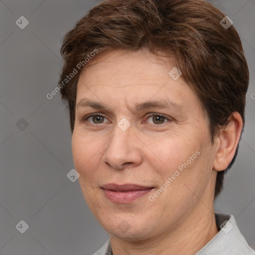 Joyful white adult female with short  brown hair and brown eyes