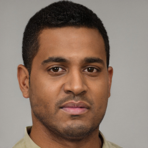 Neutral black young-adult male with short  brown hair and brown eyes