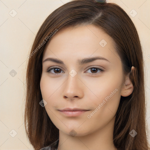 Neutral white young-adult female with long  brown hair and brown eyes